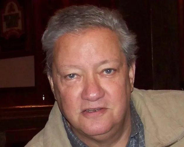 Book on Phillips’ manhunt finished with help of late talk show host’s children